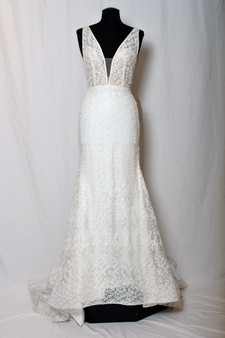 Ivory shimmer lace sheath gown, deep v plunging neckline with nude side cut outs on bodice, nude illusion back v neckline, slim skirt and chapel train.
