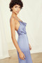 Drape neckline with low back, fit-to-flare dress with slit in fluid satin.