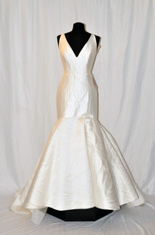 Ivory Floral silk satin daisy embossed mermaid gown, V neckline front and back, structured bodice, natural waist, elongated torso with circular skirt, chapel train.