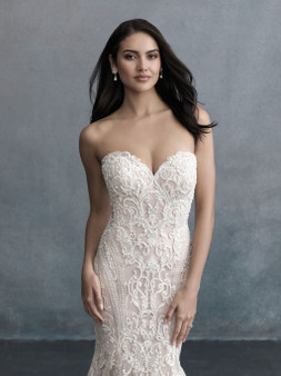 This strapless gown looks incredible on every bride and features a myriad of stunning details that have to be seen to be believed.