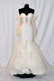 strapless sculptured neckline, soft hand beaded lace fit and flare gown, removable sheer lace sleeves, matching lace on the front and back of skirt, horsehair, chapel train